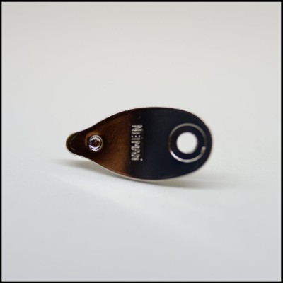 Peça metálica preta com texto WEINMANN sobre fundo branco