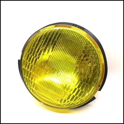 Faro dianteiro redondo amarelo com estrutura preta