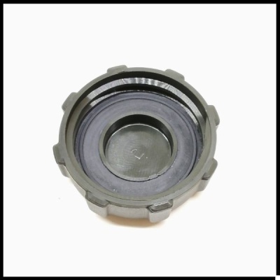 Tampa circular de plástico cinzento com selo de borracha preta