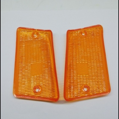 Par de lentes de farol dianteiro laranja texturizadas em relevo