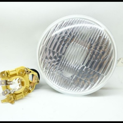 Farol redondo automóvel com suporte amarelo e conectores elétricos