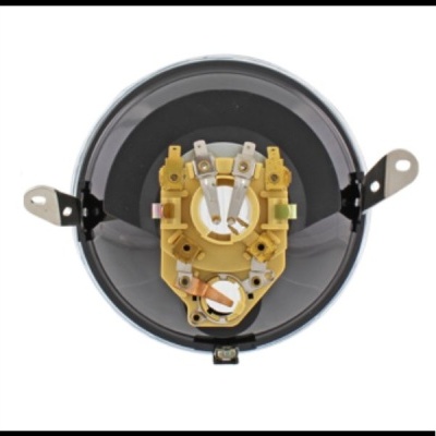 Dispositivo eletromecânico redondo com componentes internos amarelos e metálicos