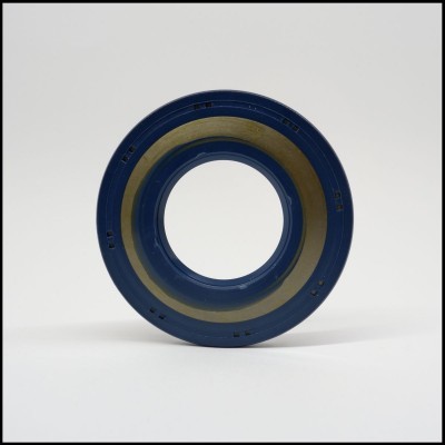 Vedante circular azul com componente metálico dourado no interior