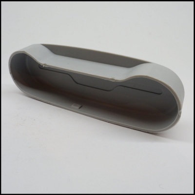 Estojo de plástico cinza claro ovalado alongado