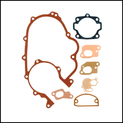 Conjunto de juntas para motor de várias cores e formatos sobre fundo branco