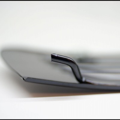 Espátula preta em fundo branco