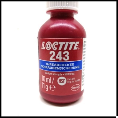 Frasco vermelho e branco de Loctite 243 Threadlocker sobre fundo branco