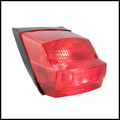 Lanterna traseira automóvel vermelha e preta em fundo branco