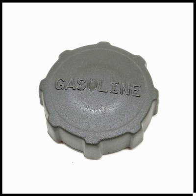 Tampa de depósito de gasolina cinzenta com a palavra GASOLINE