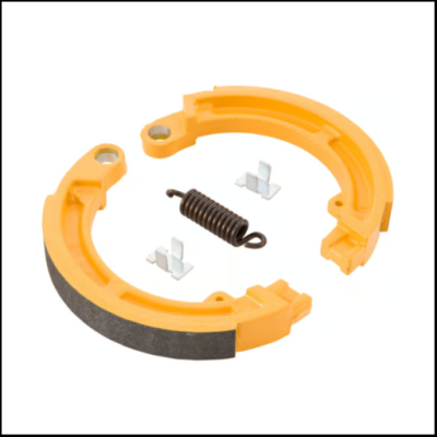 Conjunto de travões de sapata amarelos com mola e encaixes metálicos