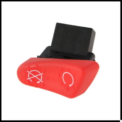 Interruptor vermelho com base preta e símbolos brancos