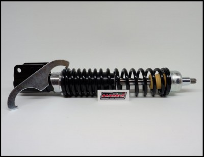 Amortecedor preto e prateado com mola helicoidal e etiqueta 'BAROSI'