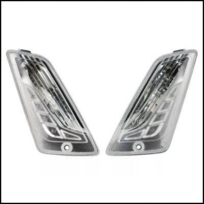 Par de faróis automóvel transparentes com detalhes prateados e pretos