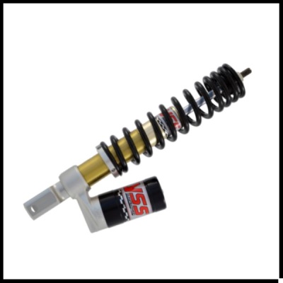 Amortecedor com mola preta e corpo dourado com etiqueta YSS