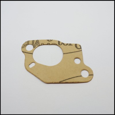 Junta recortada em papel castanho claro com orifícios circulares