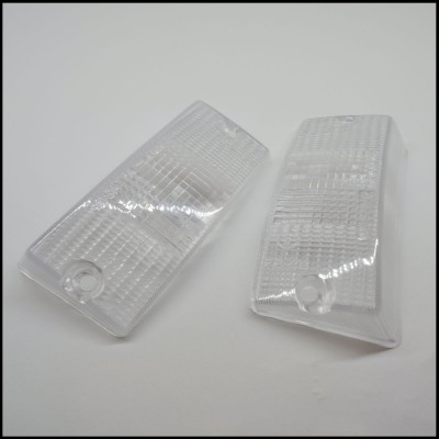 Par de capas transparentes para luzes com textura quadriculada e orifício circular