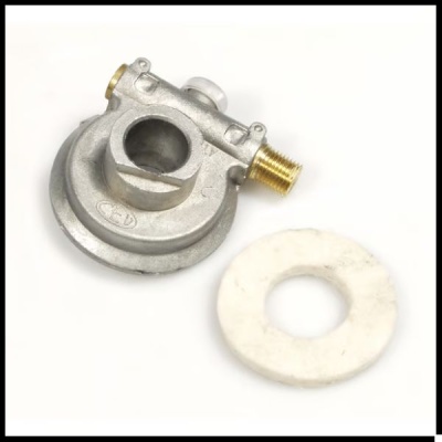 Peça metálica cilindrica prateada com bocal dourado e anel branco circular