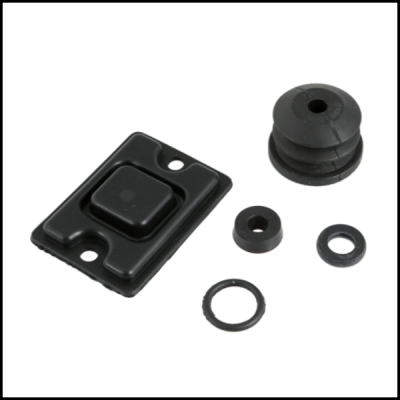 Peças pequenas pretas de borracha ou plástico em fundo branco