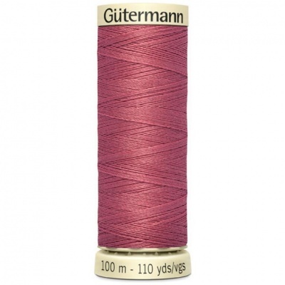 Rolo de linha rosa escura da marca Gütermann com 100 metros
