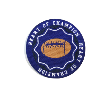 Emblema bordado redondo com bola de futebol americano e texto 'HEART OF CHAMPION'