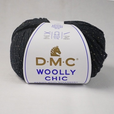 Novelo de lã preta com fios prateados e etiqueta DMC WOOLLY CHIC