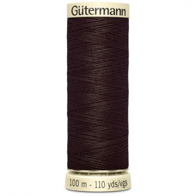 Rolo de linha castanha escura Gütermann com etiqueta e texto 100 m - 110 yds/vgs