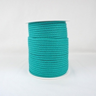 Rolo de corda verde água trançada em cilindro branco