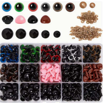 Olhos de segurança coloridos e botões de fixação em caixa organizadora