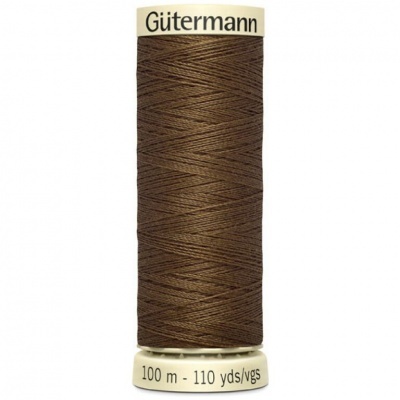 Rolo de linha castanha da marca Gütermann com 100 metros