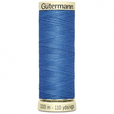 Spool of blue sewing thread labeled Gütermann