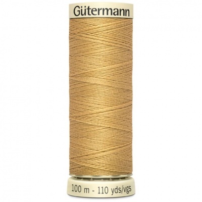 Carretel de linha de costura bege claro da marca Gütermann com texto 100 m - 110 yds/vgs
