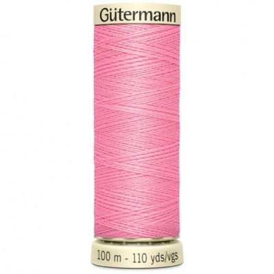 Carretel de linha de costura rosa da marca Gütermann com 100 metros.