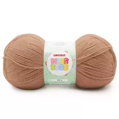 Novelo de lã bege com etiqueta branco verde clara com texto