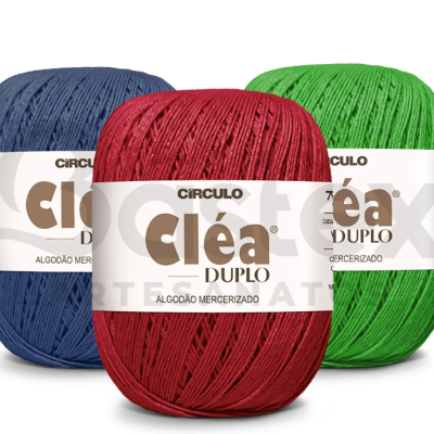 Novelo de fio algodão mercerizado Cléa Duplo em azul, vermelho e verde