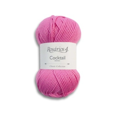 Novelo de lã cor-de-rosa com etiqueta branca da marca Rosários 4