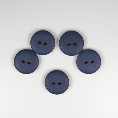 Cinco botões redondos azuis escuros sobre superfície branca