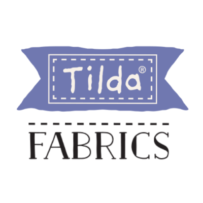 Logótipo da marca Tilda Fabrics com texto branco e azul