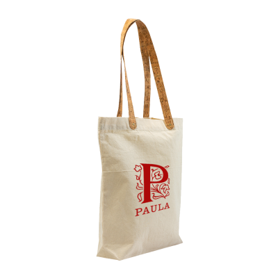 Saco de tecido cru com alças castanhas e impressão vermelha com texto PAULA