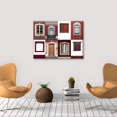 Sala moderna com poltronas castanho claro, planta e quadro de janelas de madeira