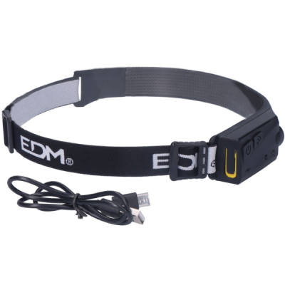 Faixa de cabeça preta com dispositivo eletrônico e cabo USB preto