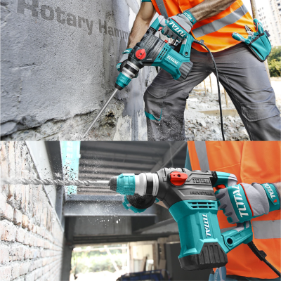 Martelo perfurador eléctrico TOTAL azul turquesa em uso para escavar paredes de cimento e tijolo