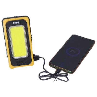Lanterna LED portátil EDM amarela ligada por cabo USB a smartphone com bateria a 89%