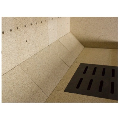 Superfície de pedra/beje com grelha preta retangular