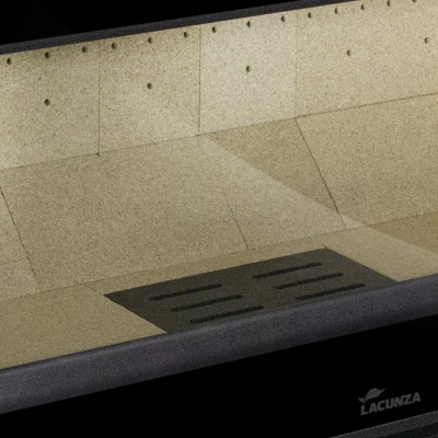 Banheira retangular de pedra bege com ralo central preto e borda preta fosca.