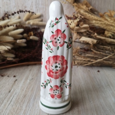 Figura decorativa em cerâmica com padrão floral vermelho e verde