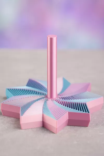 Post-it em forma de estrela rosa e azul com suporte central