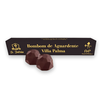 Bombons de chocolate com embalagem preta e texto dourado