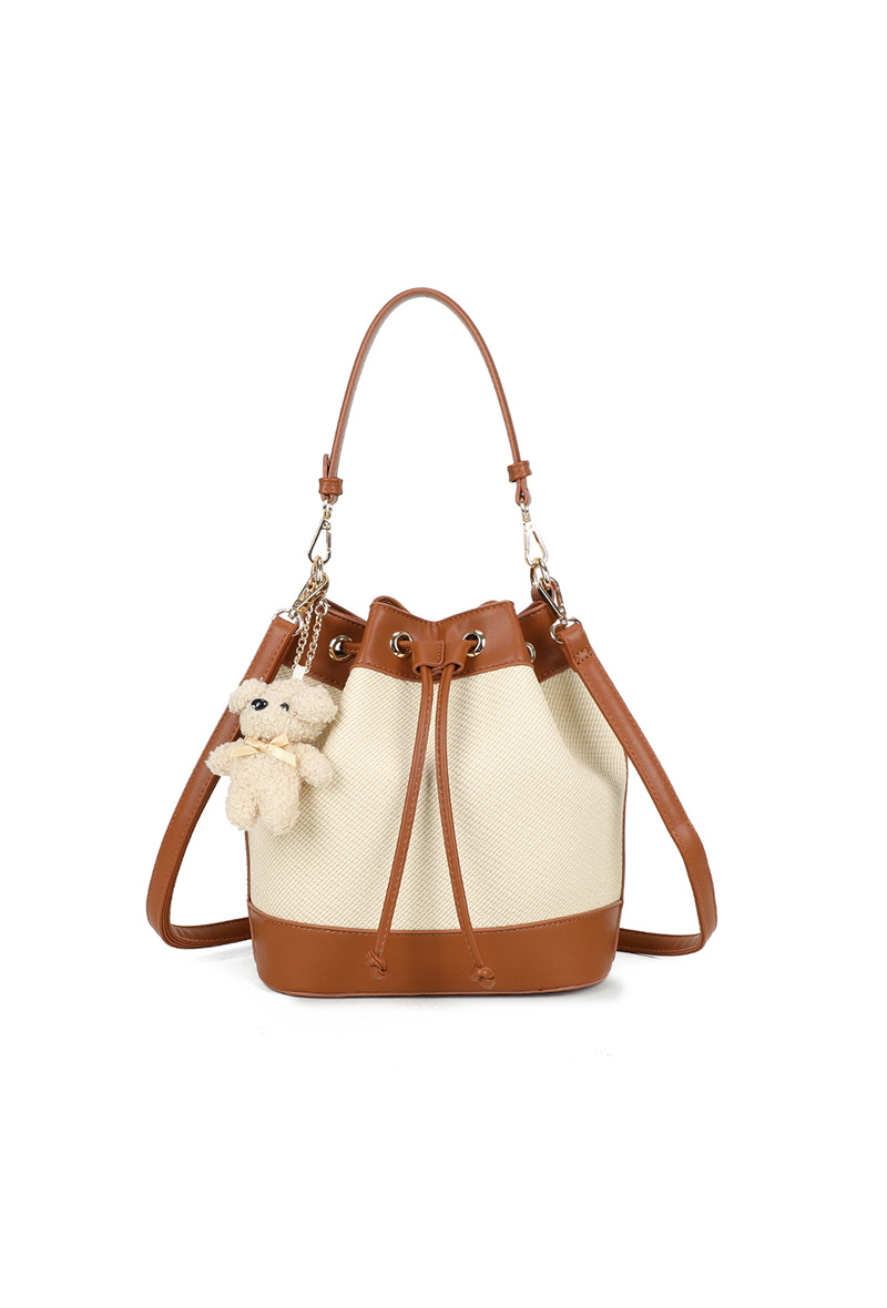 MALA RAFAELLA Mala saco bege com detalhes em pele castanha e ursinho pendurado