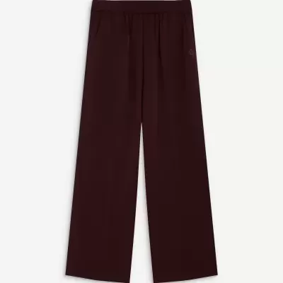 Calças castanho escuro com cintura elástica e bolsos