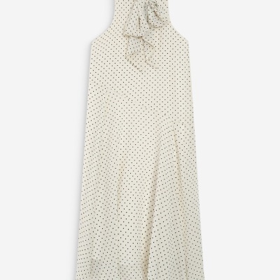 Vestido comprido creme com padrão de pois pretos e laço na gola